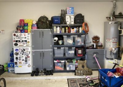 A garage with lots of items in it.