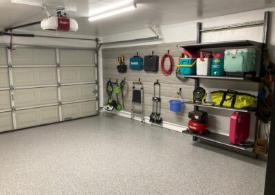 A garage with a lot of tools and equipment.