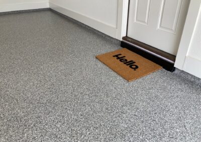 A door mat with the word hello on it.